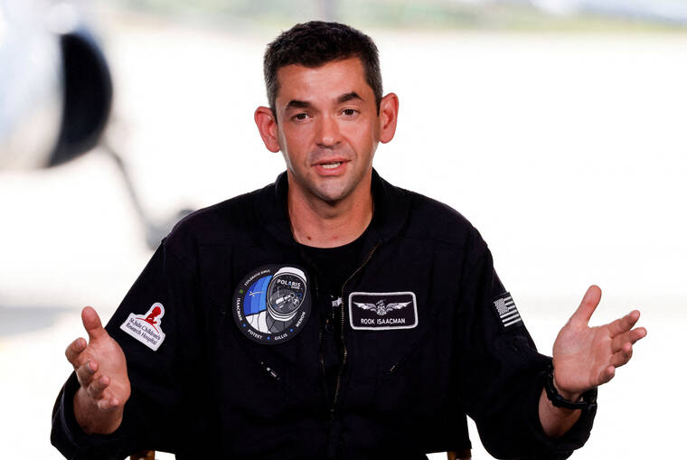 REUTERS/JOE SKIPPER / AUG. 19
                                Commander Jared Isaacman of Polaris Dawn, a private human spaceflight mission, speaks at a press conference at the Kennedy Space Center in Cape Canaveral, Fla.