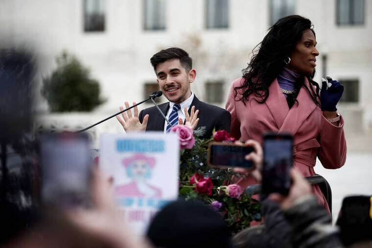 REUTERS/BENOIT TESSIER
                                Chase Strangio, the first openly transgender person to argue in front of the U.S. Supreme Court, speaks next to Peppermint outside the court following arguments over an appeal by President Joe Biden’s administration of a lower court’s decision upholding a Republican-backed ban in Tennessee on gender-affirming medical care for transgender minors, in Washington.