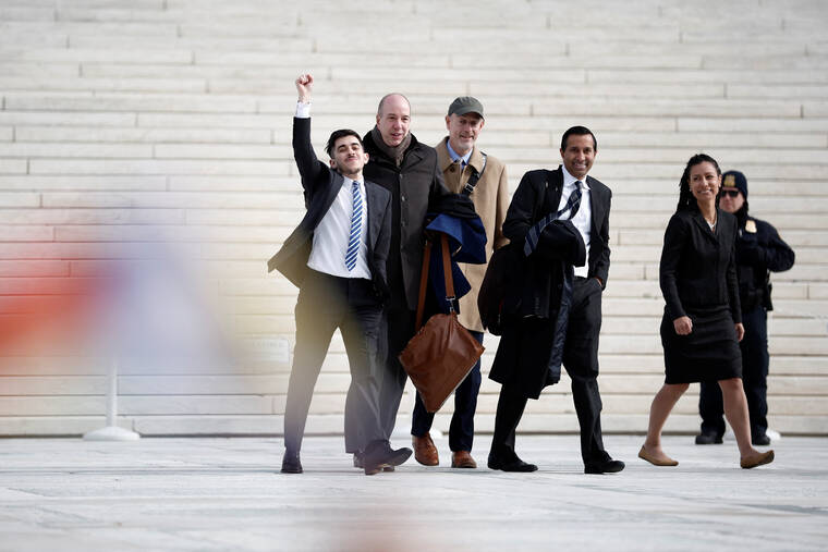 REUTERS/BENOIT TESSIER
                                Chase Strangio, the first openly transgender person to argue in front of the U.S. Supreme Court, accompanied by the legal team, walks out of the court on the day it heard arguments over an appeal by President Joe Biden’s administration of a lower court’s decision upholding a Republican-backed ban in Tennessee on gender-affirming medical care for transgender minors, in Washington.