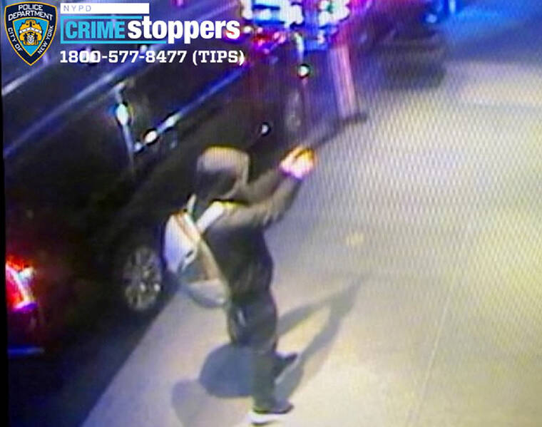 NYPD NEWS/HANDOUT VIA REUTERS
                                An image of the individual sought in connection to the investigation of the shooting death of Brian Thompson, the CEO of UnitedHealth’s insurance unit, is seen in a still image from surveillance video taken outside a hotel in the Manhattan borough of New York City.