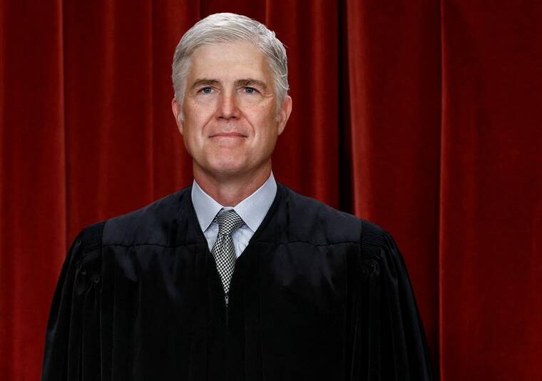 REUTERS/EVELYN HOCKSTEIN / OCT. 7
                                Supreme Court Associate Justice Neil M. Gorsuch poses during a group portrait at the Supreme Court in Washington.