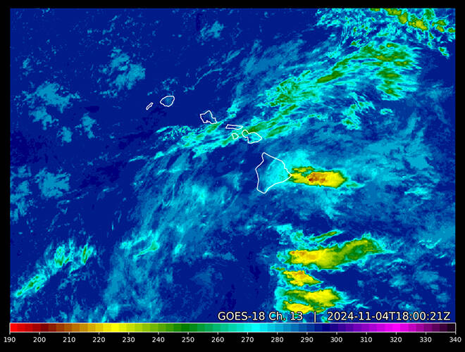 COURTESY NOAA
                                This color-enhanced satellite image shows rainy weather over the Hawaiian islands this morning.