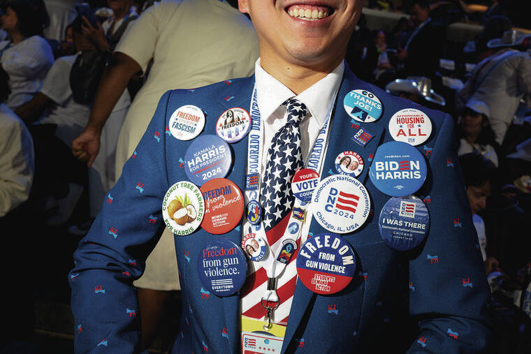 NEW YORK TIMES
                                A Democratic delegate carries the party’s messages with him during the Democratic National Convention at the United Center in Chicago on Aug. 22.