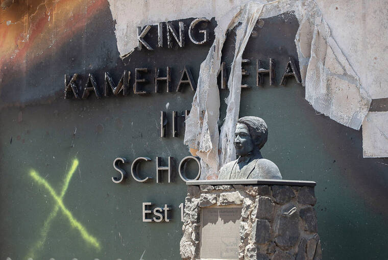 CINDY ELLEN RUSSELL / 2023
                                The burnt facade of King Kamehameha III Elementary School is seen at Lahaina’s Front Street.