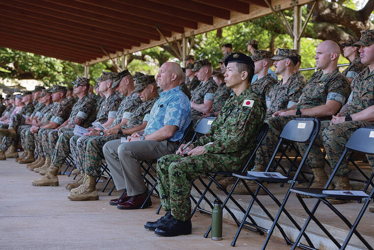 U.S. MARINE CORPS / NOV. 26
                                Japan Ground Self-Defense Force Lt. Col. Kiyokazu Motokura, a liaison officer to the U.S. Marine Corps, attends a ceremony hosted by the U.S. 3rd Marine Littoral Regiment at Marine Corps Base Hawaii as they receive the new NMESIS missile system.