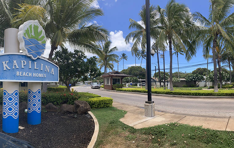 CRAIG T. KOJIMA / CKOJIMA@STARADVERTISER.COM
                                A Kapilina Beach Homes sign near the guard shack at Iroquois Drive marks the entry to the complex Sunday.