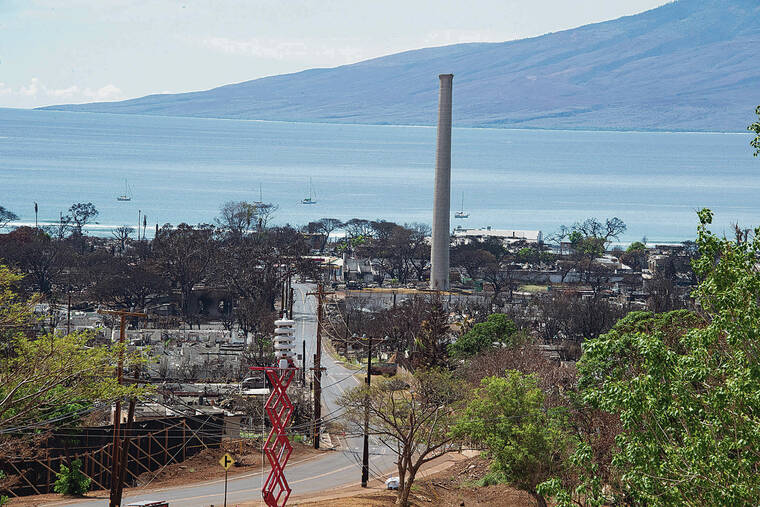 CRAIG T. KOJIMA / CKOJIMA@ STARADVERTISER.COM
Lahainaluna Road is seen along with Lahaina town. Maui County this morning marked a milestone in recovery from last years wildfires upon officially reopening Lahainaluna Road for unrestricted public access.