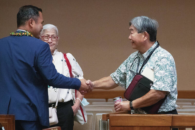 GEORGE F. LEE / GLEE@STARADVERTISER.COM
                                Honolulu City Council member Tyler Dos Santos- Tam, left, shook hands with Ernie Lau, manager and chief engineer of the Board of Water Supply, following a hearing Wednesday at Honolulu Hale on Red Hill water testing.