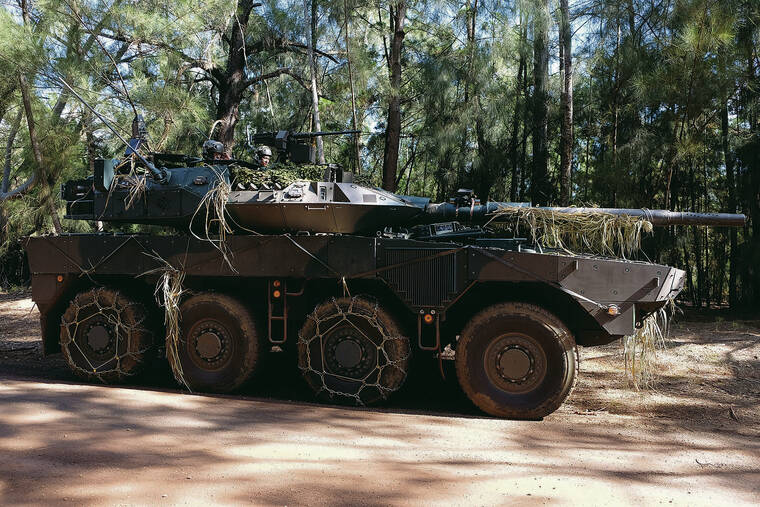 KEVIN KNODELL / KKNODELL@STARADVERTISER.COM / OCT. 15
                                Members of the Japan Ground Self-Defense Force operate an armored vehicle at Schofield Barracks during the 2024 training rotation of the Joint Pacific Multinational Readiness Center.