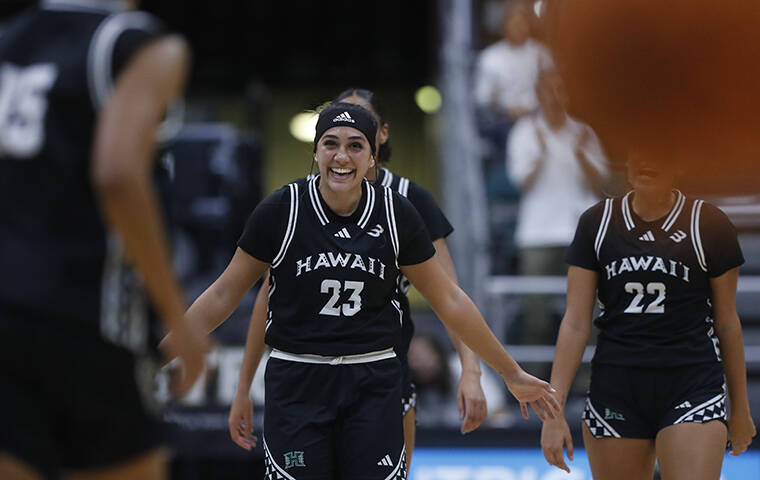 JAMM AQUINO/JAQUINO@STARADVERTISER.COM
                                Hawai’i guard MeiLani McBee (23) reacts after a three-point basket against the Eastern Washington Eagles during the first half of a women’s NCAA basketball game on Sunday, Nov. 24, 2024, in Honolulu.