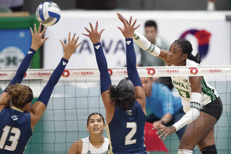 GEORGE F. LEE / OCTOBER 11
                                Hawaii junior outside hitter Caylen Alexander took a swing against UC Davis during a match at SimpliFi Arena at Stan Sheriff Center.